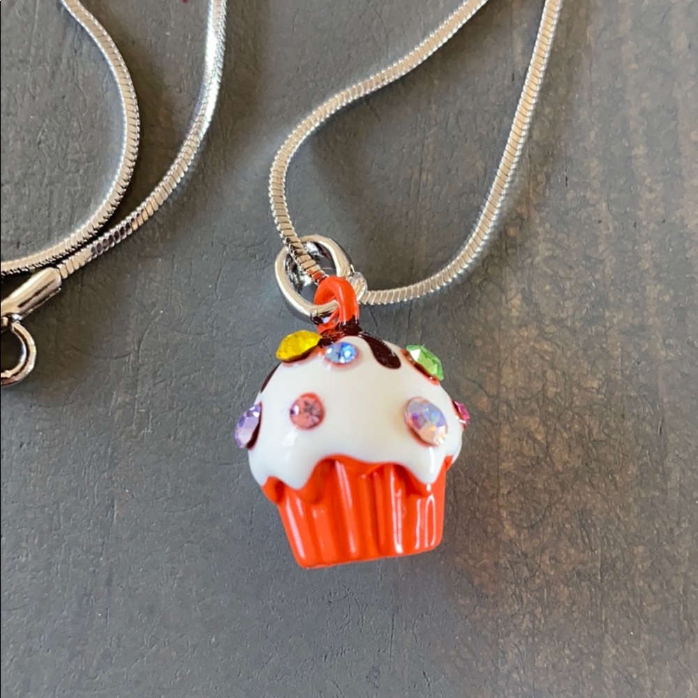 Orange cupcake with crystals brand new necklace..